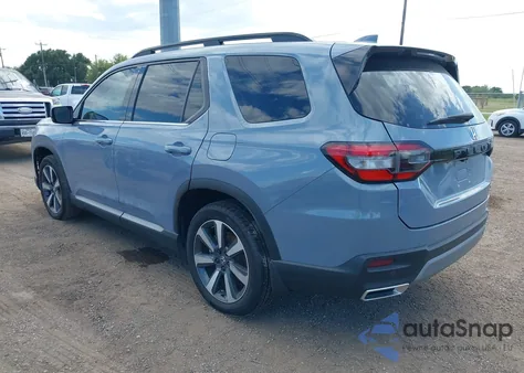 2023 Honda Pilot 2Wd Touring z USA, uszkodzony, nr VIN 5FNYG2H7XPB014642